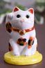 Stylish Kutani Ware Oval-Riding Maneki-Neko (Lucky Cat) Figurine by Waza No Kura. Perfect As a Gift for Housewarmings or Store Openings.