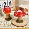 A Pair of Three-dimensional Mushroom Candle Holder Ornaments with Simulated Red Mushroom Candle Holders and Creative