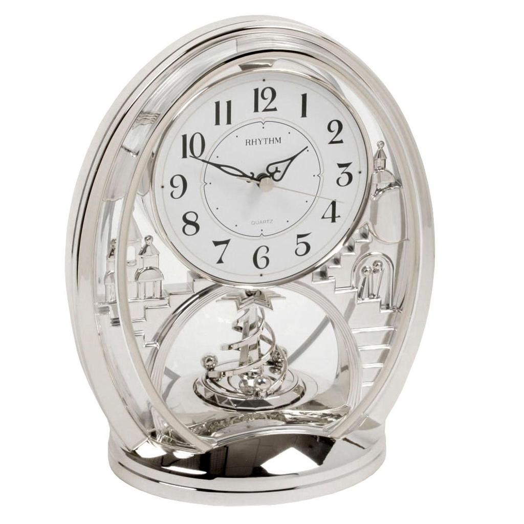 Rhythm Cont Mantel Clk Oval Silver/Arabic Dial/Rotating Pend