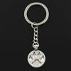Fashion Keychain 28x21mm Dog Bear Cat Paw Silver Color Pendants DIY Men Jewelry Car Key Chain Ring Holder Souvenir For Gift