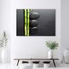 Canvas Print, Bamboo and Zen Stones On Black Background