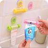 1 Pc Rolling Squeezer Toothpaste Dispenser Tube Sucker Hanging Holder MIT