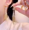 Golden Fashion Luxury Tassel Drop  Dangle Earrings for Women - Elegant Long Fringe Design with Rhinestone Embellishments Popular  Delicate Jewelry
