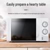 Compact Microwave Oven - High-Power, Multifunctional Kitchen Appliance with Mechanical Knob, Steam & Bake Options