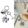 Elegant Heart Phone Bag Accessory Fashionable Silver Bowknot Keychain with Heart Charm Unique Keyrings Accessory