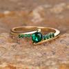 Vintage Minimalist Gold Engagement Ring with Green Round Stone and Decorative Accents