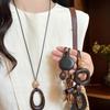 Retro Ethnic Heart Necklace: Wooden Flower Pendant Sweater Chain for Women