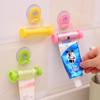 1 Pc Rolling Squeezer Toothpaste Dispenser Tube Sucker Hanging Holder ARI