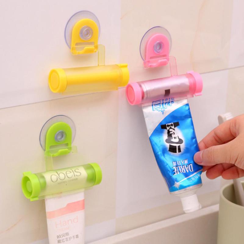 1 Pc Rolling Squeezer Toothpaste Dispenser Tube Sucker Hanging Holder MIT