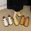 Retro Woven Baotou Sandals Women's Summer 2025 New Fashion Hollow Pig Cage Shoes Flat-soled Soft-soled Casual Roman Shoes