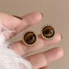 Женские серьги Мурад Тигровый глаз Камень Круглые витые серьги Женский высокий уровень Чувство ниши Дизайн Легкая роскошная сотня с серьгами для поездок на работу
