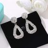 Bohemia Lady's Geometric Emboss Hollow Teardrop Dangle Stud Ear Beauty Fashion Decor