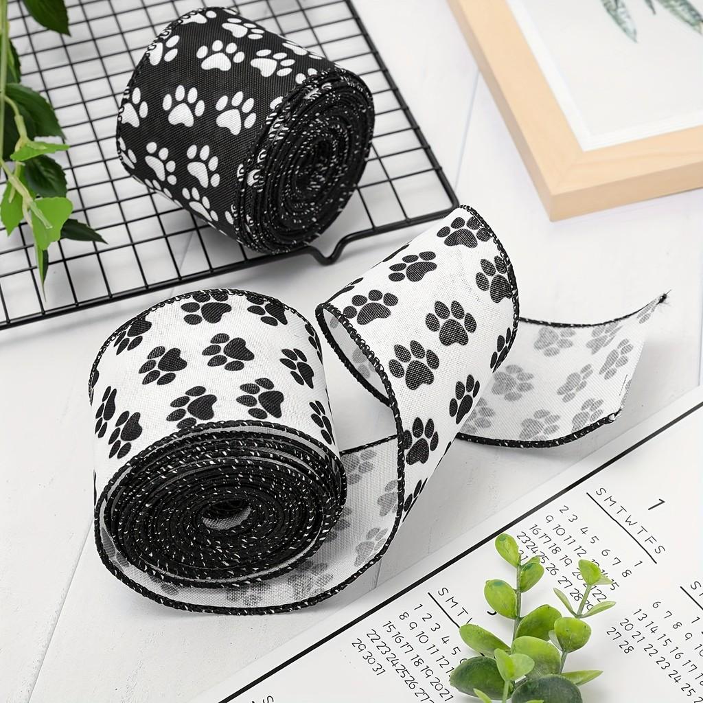 Highquality Satin White Ribbon Adorned With Black Paw Prints Ideal For Creative Crafts Petthemed