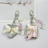 Pearl Bowknot Metal Keychain With Heart Shaped Mirror Y2K Style Bag Keyring Sweet Cool Trendy  Earphone Camera Pendant